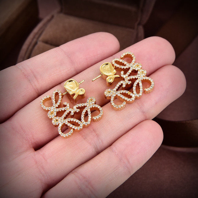 PAVED ANAGRAM GOLD EARRINGS