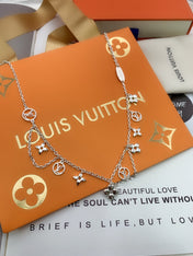 STAR AND SUN MULTI CHARM SILVER NECKLACE