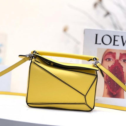 LOE MINI 18 PUZZLE BAG IN YELLOW CALFSKIN