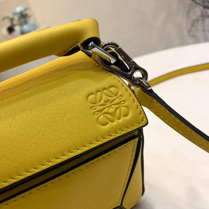 LOE MINI 18 PUZZLE BAG IN YELLOW CALFSKIN