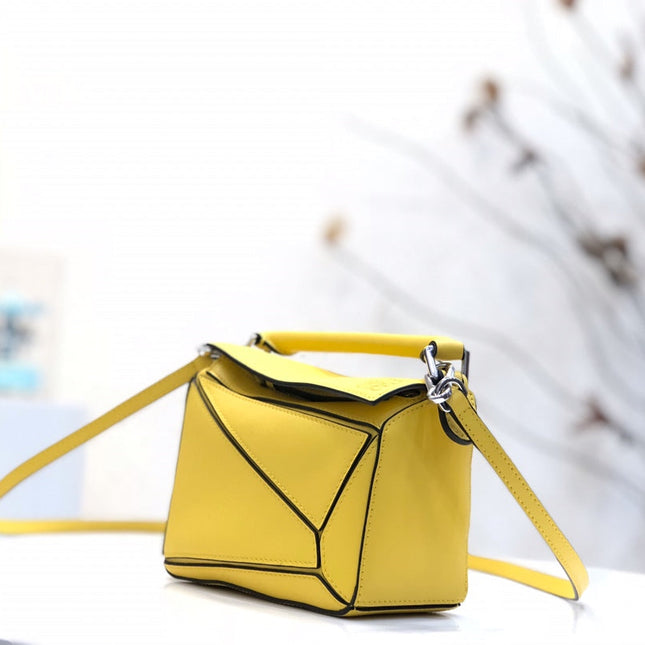 LOE MINI 18 PUZZLE BAG IN YELLOW CALFSKIN