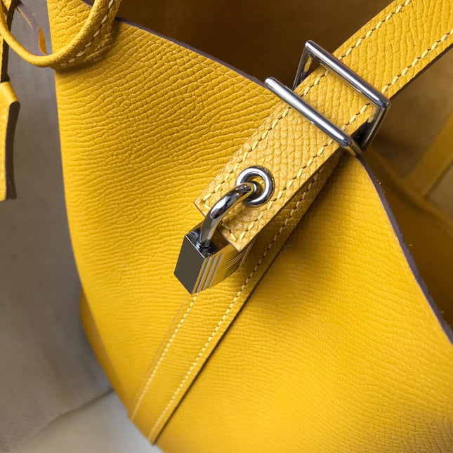 HM PICOTIN LOCK 18 YELLOW CALFSKIN WITH BRAID STRAP