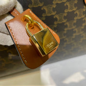 CELINE 25S HORIZONTAL CABAS 34MM IN BLACK TRIOMPHE CANVAS AND BROWN CALFSKIN