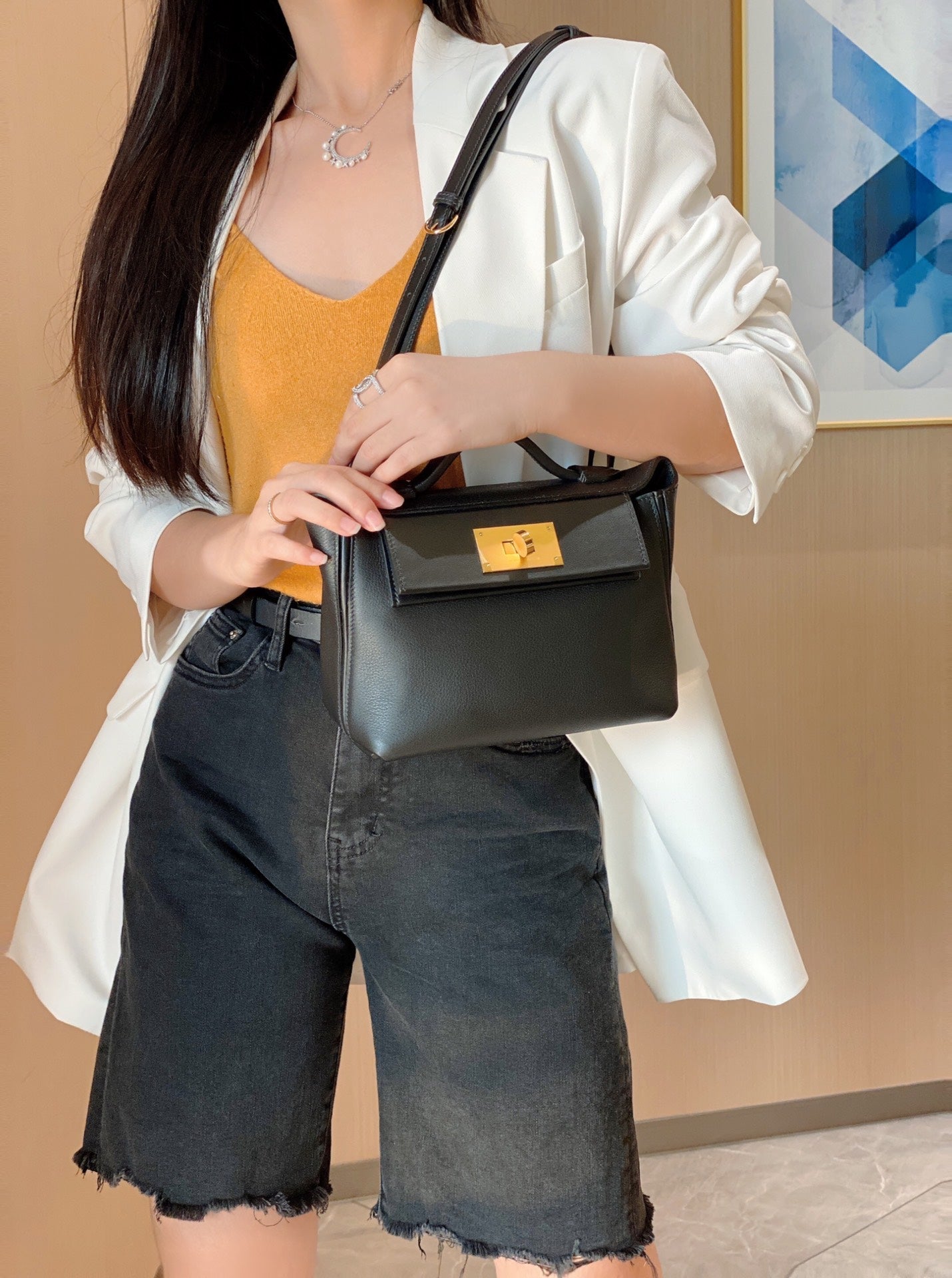 MINI 24/24 21CM IN BLACK EVERCOLOR CALFSKIN GOLD KELLY BUCKLE