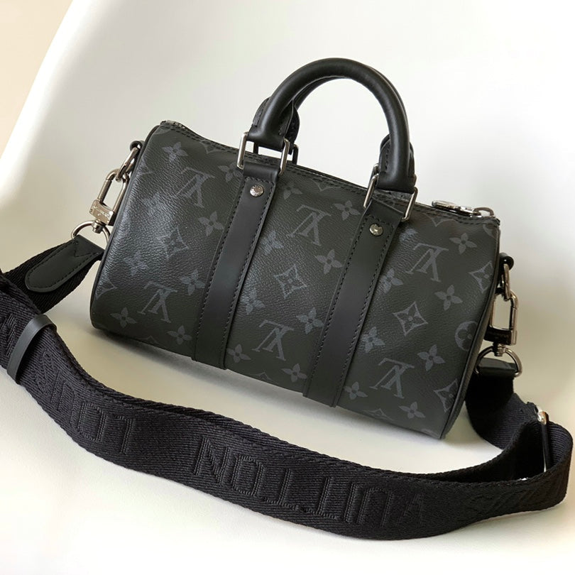 KEEPALL BANDOULIÈRE 25 IN BLACK MONOGRAM HERITAGE CANVAS