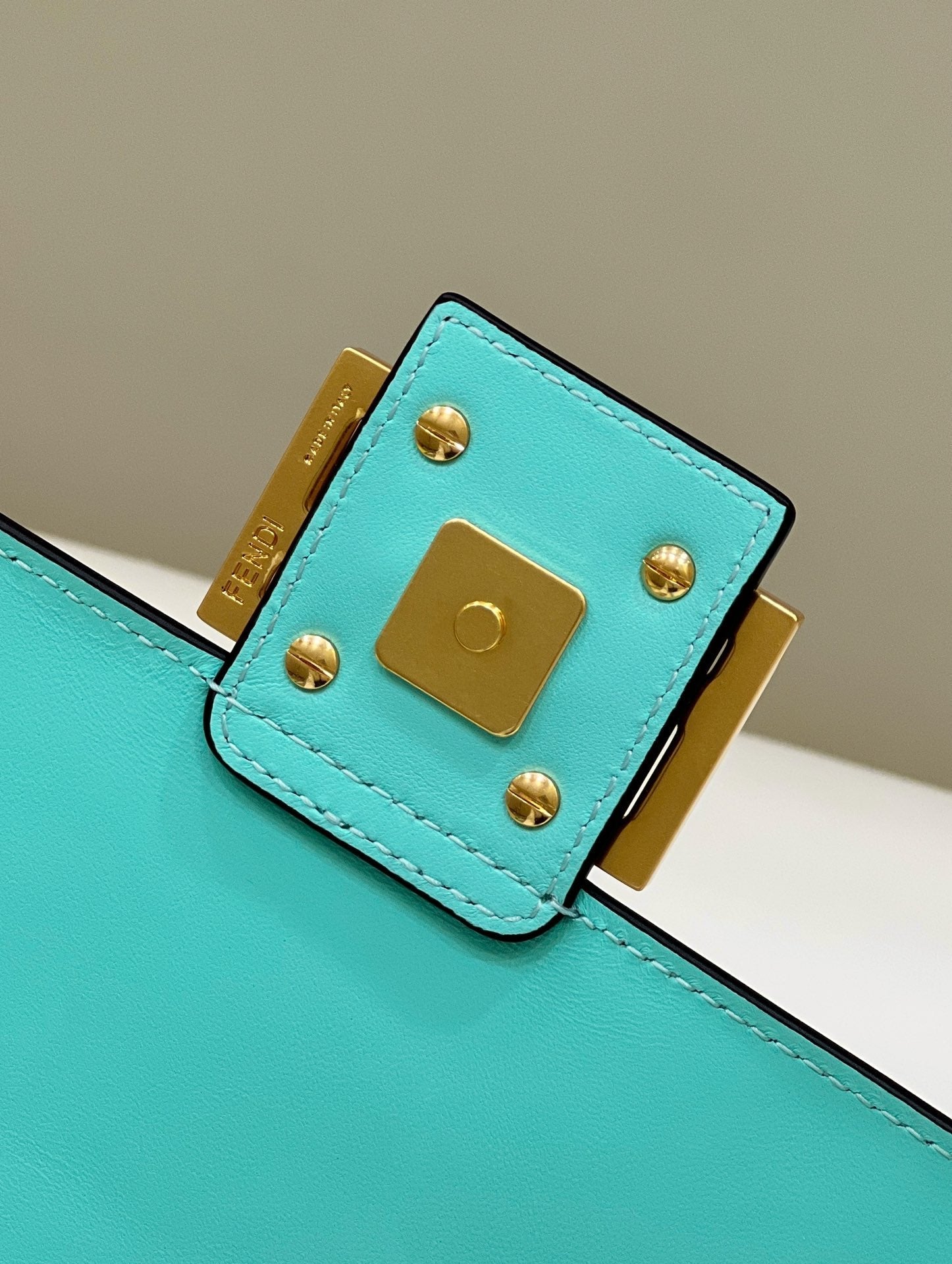 BAGUETTE WITH FF MOTIF 27 IN TURQUOISE SOFT LAMBSKIN GOLD HARDWARE