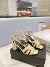 SL TRIBUTE SANDAL GLOSSY PASTEL YELLOW CALFSKIN