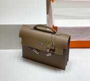 KELLY DEPECHES 34 BRIEFCASE IN ETOUPE TOGO CALFSKIN SILVER HARDWARE
