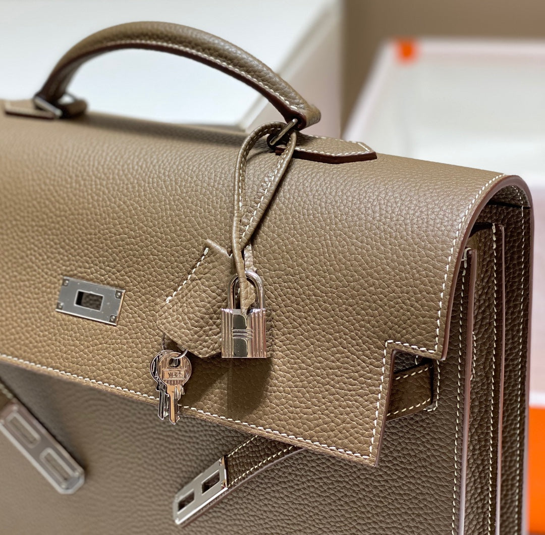 KELLY DEPECHES 34 BRIEFCASE IN ETOUPE TOGO CALFSKIN SILVER HARDWARE