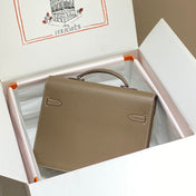 KELLY DEPECHES 34 BRIEFCASE IN ETOUPE TOGO CALFSKIN SILVER HARDWARE