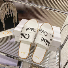CHLOÉ WOODY SLIPPER IN WHITE MIX BLACK CANVAS