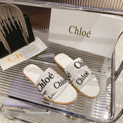 CHLOÉ WOODY SLIPPER IN WHITE MIX BLACK CANVAS