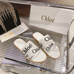 CHLOÉ WOODY SLIPPER IN WHITE MIX BLACK CANVAS