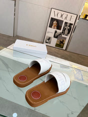 WOODY MULE IN WHITE LAMBSKIN WITH EMBROIDERED LOGO