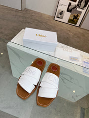 CHLOÉ WOODY MULE IN WHITE LAMBSKIN WITH EMBROIDERED LOGO