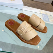 WOODY MULE IN TUSCAN BEIGE LAMBSKIN WITH EMBROIDERED LOGO