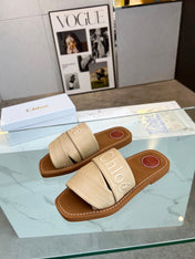 WOODY MULE IN TUSCAN BEIGE LAMBSKIN WITH EMBROIDERED LOGO