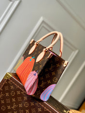 LV x YK ONTHEGO 25 IN BROWN MONOGRAM COATED CANVAS AND CALFSKIN PUMPKIN PATTERN