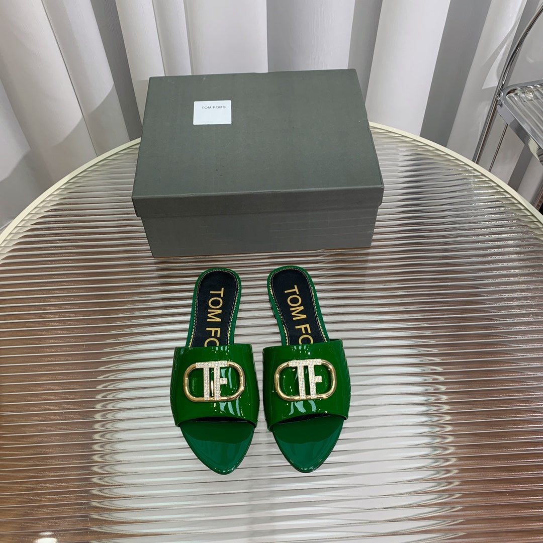 FLAT SLIDE IN PINE GREEN METALLIC CALFSKIN