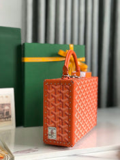 GRAND HÔTEL TRUNK BAG 24 IN ORANGE GOYARDINE CANVAS AND CALFSKIN