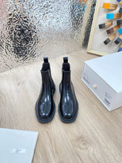 ANKLE BOOTS IN BLACK PATENT CALFSKIN