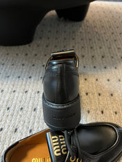 MIUMIU 26S LACED FUME SHOES IN BLACK GLOSSY CALFSKIN