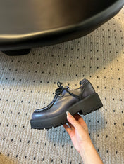 MIUMIU 26S LACED FUME SHOES IN BLACK CALFSKIN