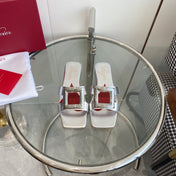 VIV' BY THE SEA LOVE METAL MULES IN SILVER PATENT CALFSKIN