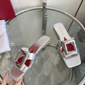 VIV' BY THE SEA LOVE METAL MULES IN SILVER PATENT CALFSKIN