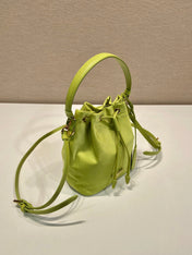 BUCKET BAG 19 IN APPLE GREEN RE-NYLON AND SAFFIANO LEATHER HANDLE