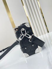 SIDE TRUNK 21 IN BLACK MONOGRAM EMBOSSED CALFSKIN SILVER HARDWARE