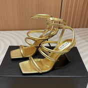 ALAIA THREE-STRAPS HIGH HEEL SANDALS IN GOLDEN PATENT LAMBSKIN