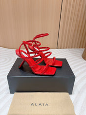 ALAIA THREE-STRAPS HIGH HEEL SANDALS IN CHERRY RED PATENT LAMBSKIN