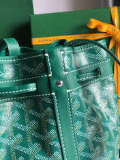 PETIT FLOT BUCKET BAG 22 IN GREEN GOYARDINE CANVAS AND LAMBSKIN TRIM