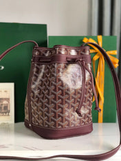 PETIT FLOT BUCKET BAG 22 IN WINE RED GOYARDINE CANVAS AND LAMBSKIN TRIM