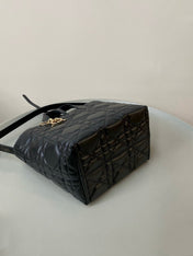 MEDIUM TOUJOURS BUCKET BAG 22 IN BLACK CANNAGE CALFSKIN