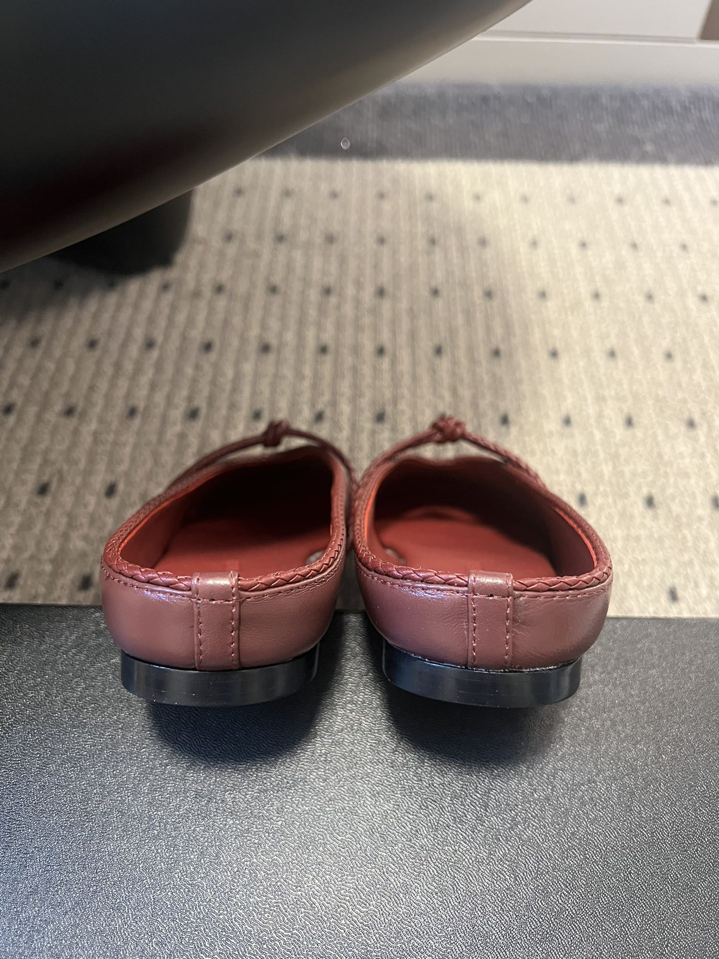 BOTTEGA VENETA 26S FLAT MULES IN DARK RED LAMBSKIN