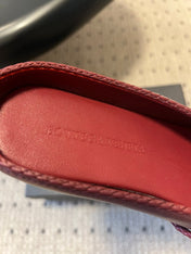BOTTEGA VENETA 26S FLAT MULES IN DARK RED LAMBSKIN