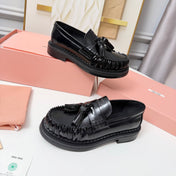 MIUMIU 26S TASSEL LOAFERS IN BLACK CALFSKIN