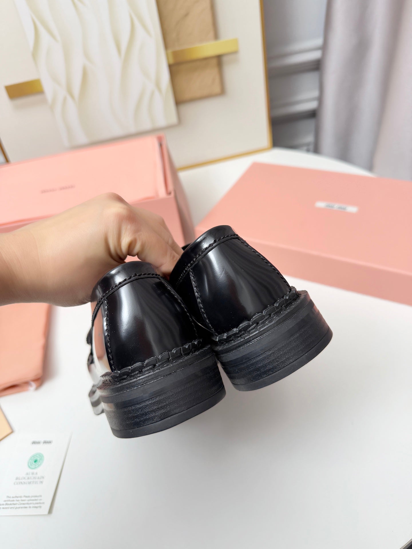 MIUMIU 26S TASSEL LOAFERS IN BLACK CALFSKIN