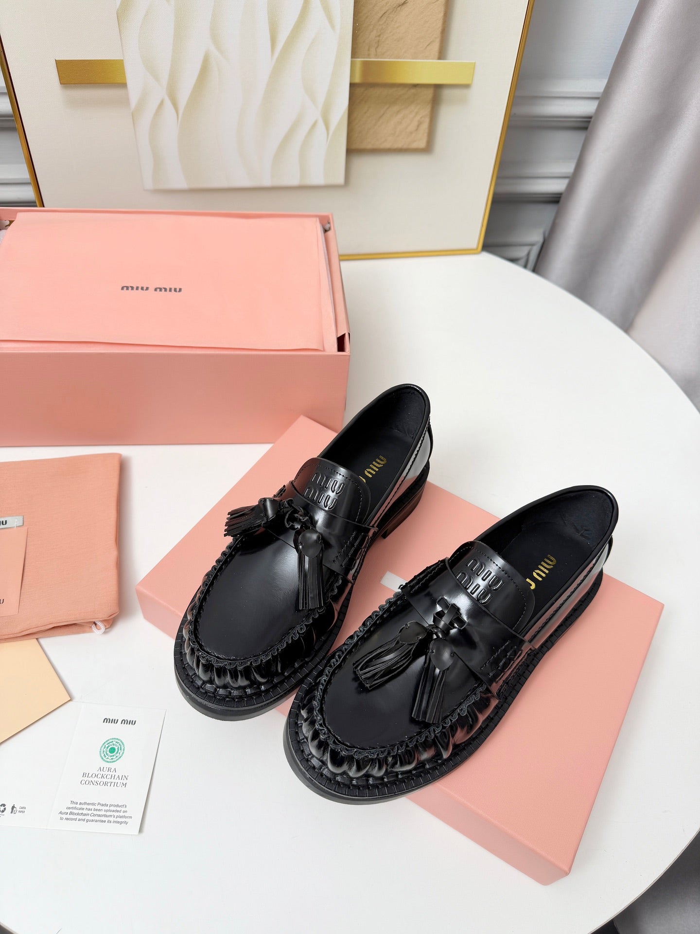 MIUMIU 26S TASSEL LOAFERS IN BLACK CALFSKIN