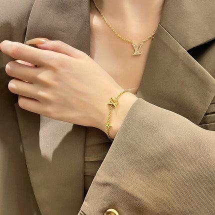 LV LOGO STAR MOTIF GOLD BRACELET