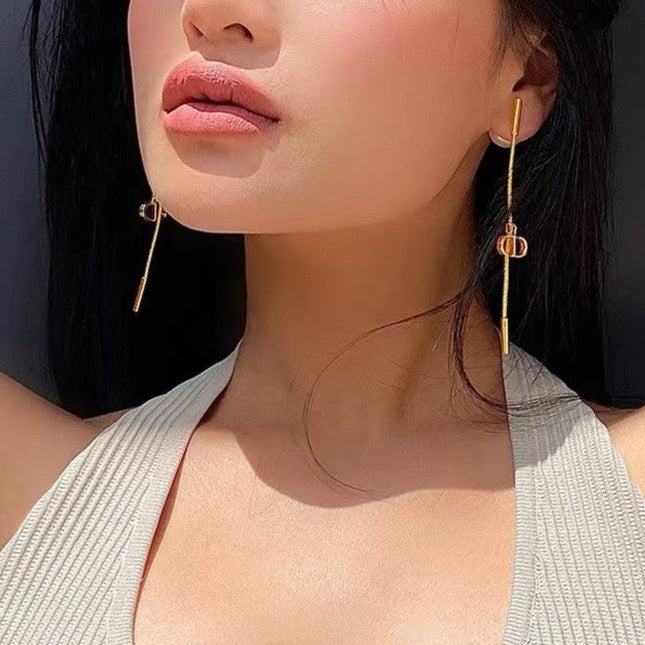 CD LONG DROP GOLD EARRINGS