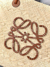 MEDIUM ANAGRAM BASKET BAG 46 IN BEIGE IRACA PALM AND TAN CALFSKIN