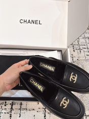 SLINGBACK LOAFER IN BLACK CALFSKIN AND SHEARLING