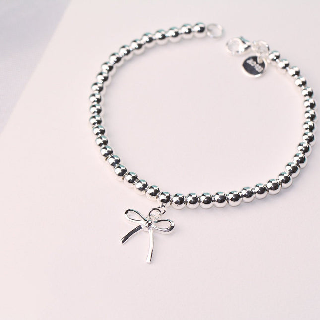 STERLING SILVER BOW BEAD BRACELET