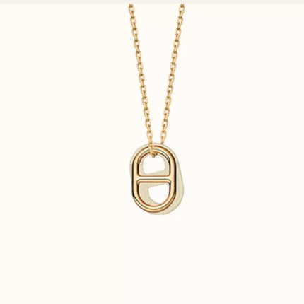 O'MAILLON PENDANT IN SWIFT CALFSKIN WITH GOLD PLATED HARDWARE