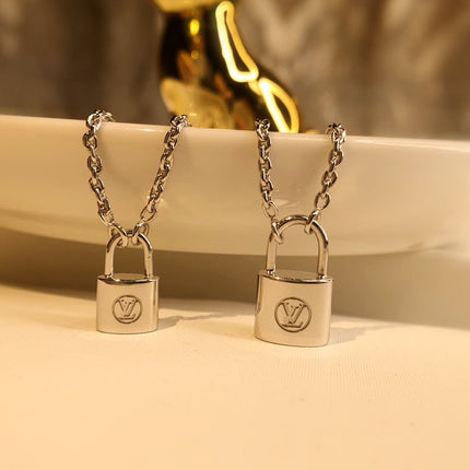 LV CHARITY LOCK NECKLACE