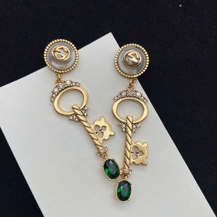 KEY SHAPED DANGLE GG EARRING