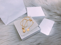 CD DICE NECKLACE